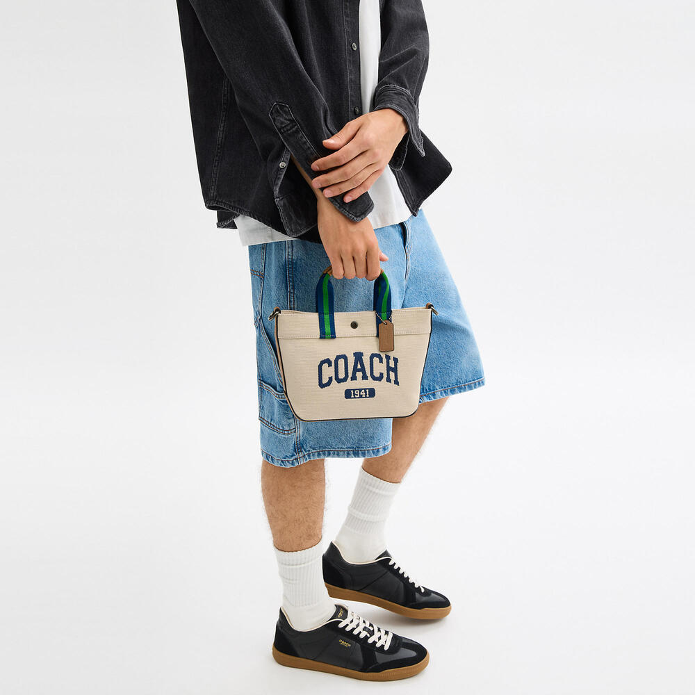 💙 Coach NWT Tan Canvas Tote Bag 20 With Coach Graphic and Wide Crossbody Strap - Picture 4 of 10